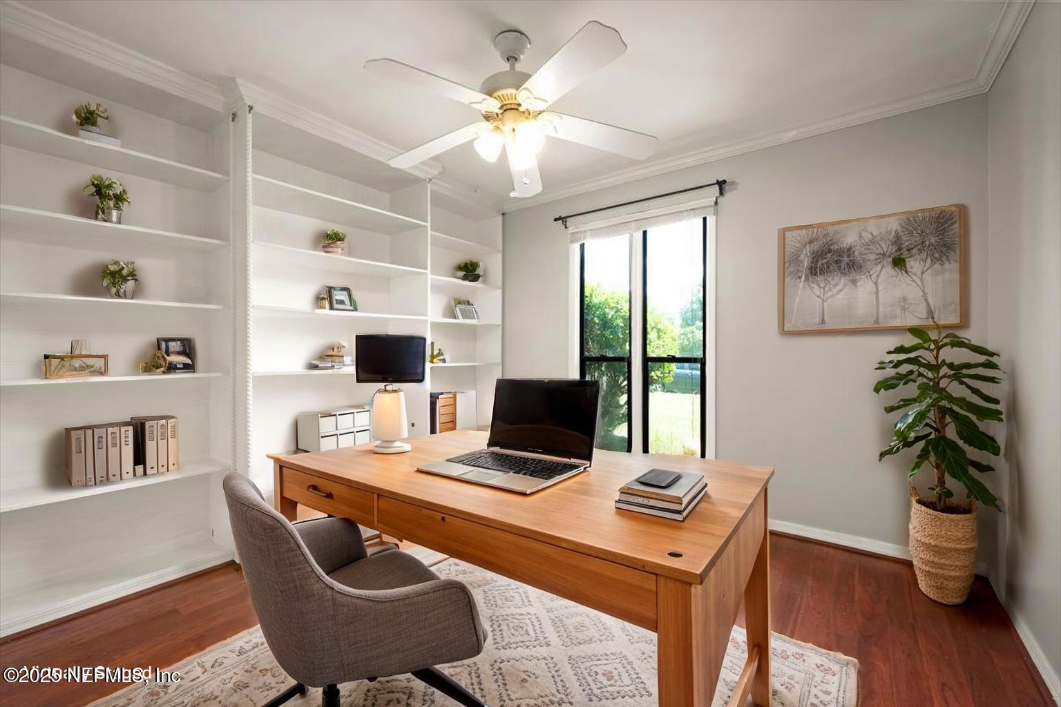 2477 Ridgecrest Avenue Orange Park, FL 32065 - Photo 18 of 28 a workspace with furniture and a potted plant