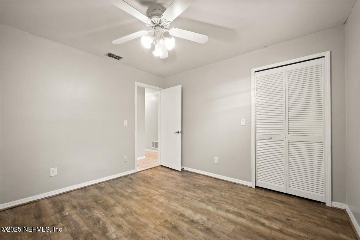 2477 Ridgecrest Avenue Orange Park, FL 32065 - Photo 22 of 28 an empty room with fan