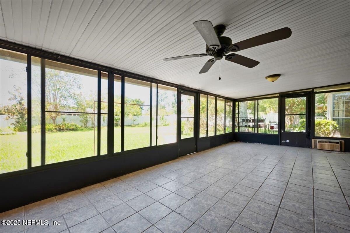 2477 Ridgecrest Avenue Orange Park, FL 32065 - Photo 4 of 28 a view of an empty room with a window