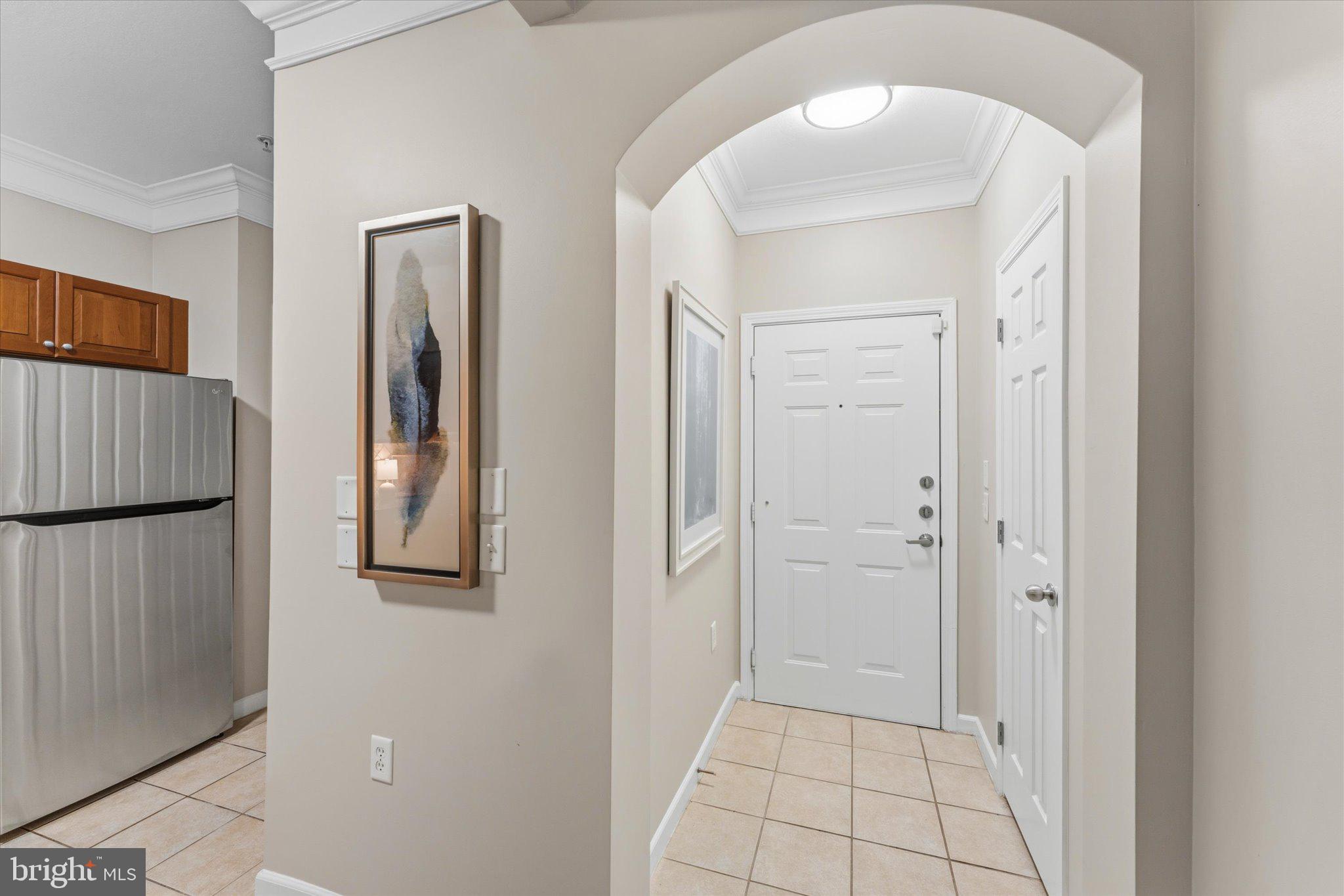 503 Sunset View Terrace Southeast, Unit 101 Leesburg, VA 20175 - Photo 9 of 39 Welcoming entryway with modern charm.
