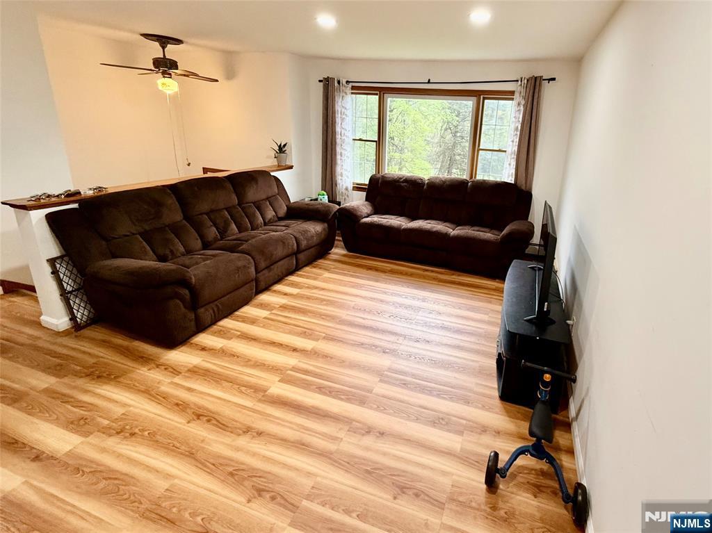 154 Cork Hill Road Franklin, NJ 07416 - Photo 4 of 35 a living room with furniture and a window