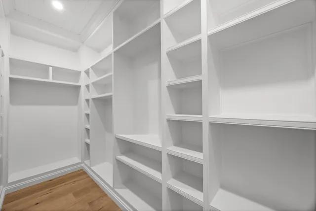 a view of an empty walk in closet