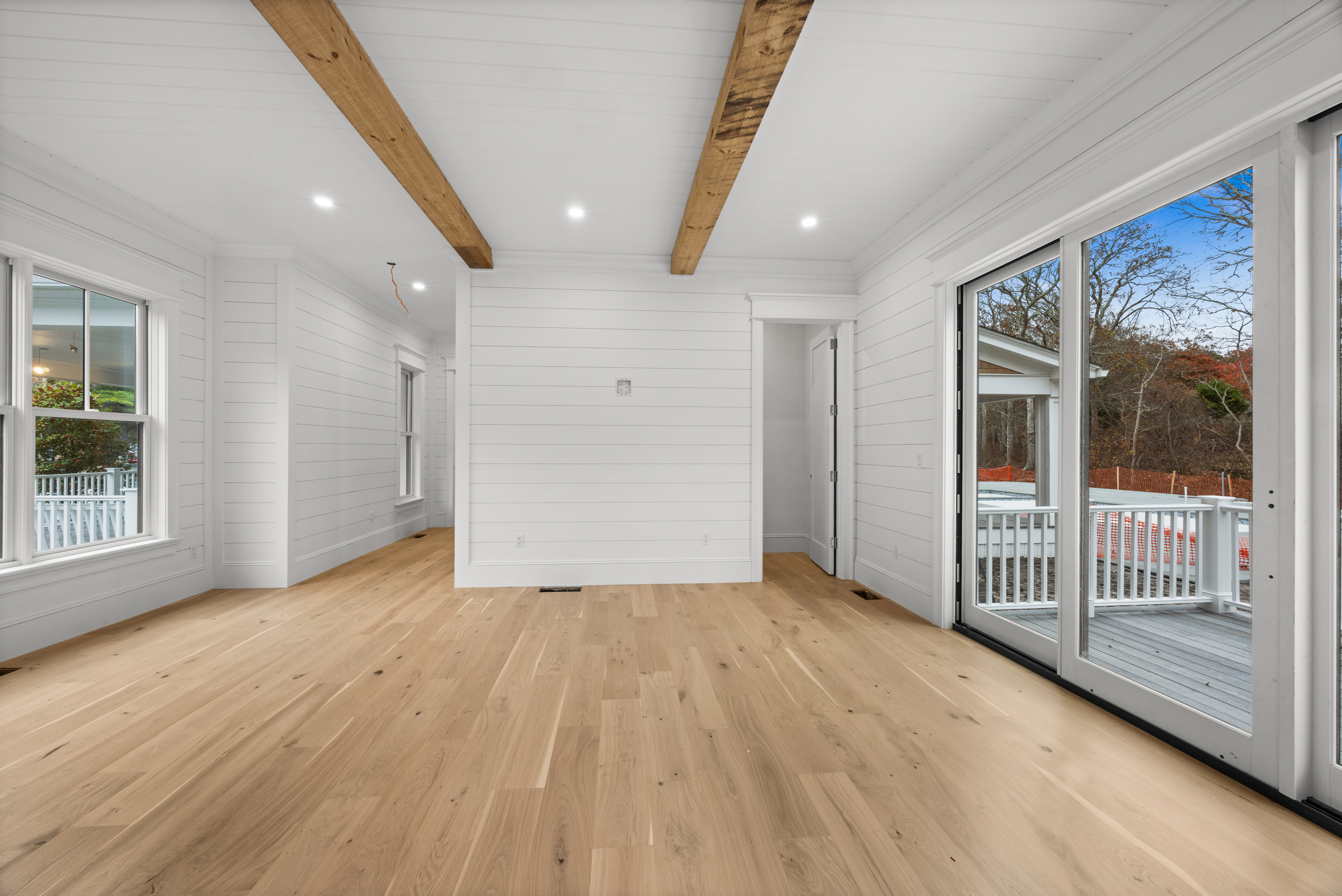 14 Trapps Pond Road Edgartown, MA 02539 - Photo 26 of 34 a view of a livingroom with wooden floor and door