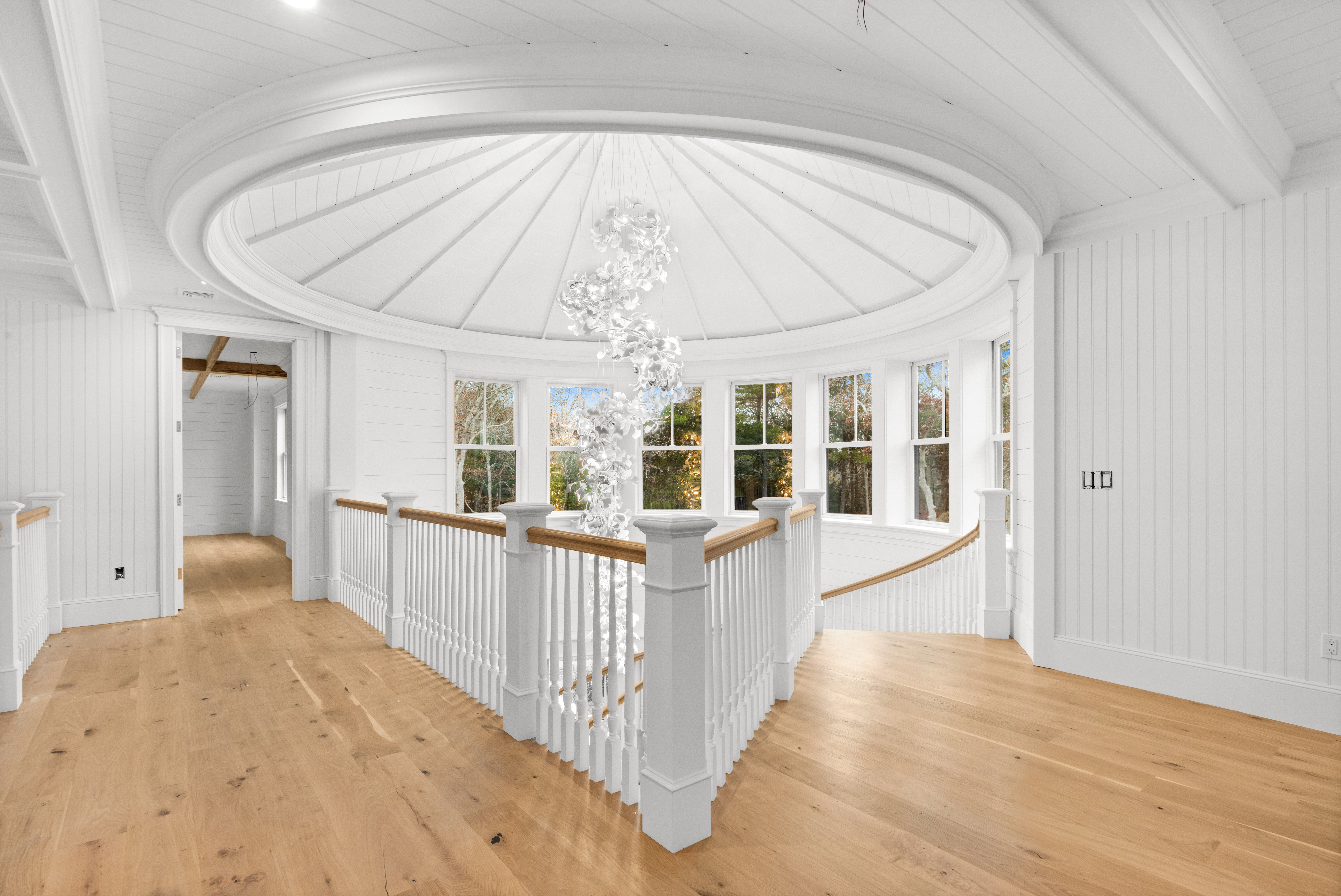 14 Trapps Pond Road Edgartown, MA 02539 - Photo 29 of 34 a view of a bedroom with wooden floor and windows