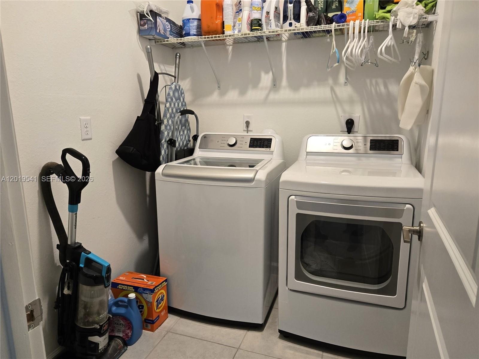 24400 Southwest 119th Place Homestead, FL 33032 - Photo 11 of 22 a utility room with dryer and washer