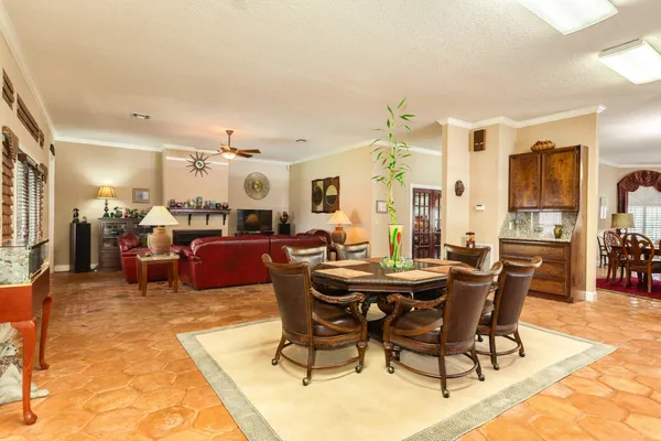 a kitchen with granite countertop a sink and cabinets