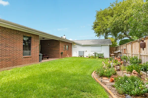 a front view of a house with a yard and porch