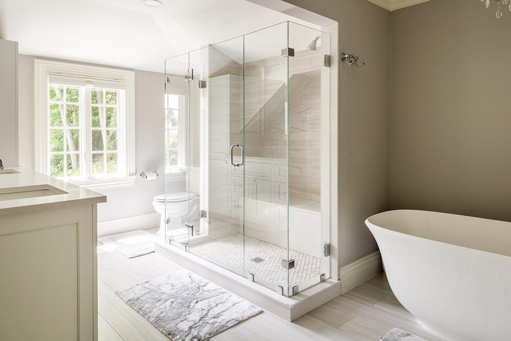 111 Gordon Road Newton, MA 02468 - Photo 12 of 19 a bathroom with a bathtub a toilet and a shower