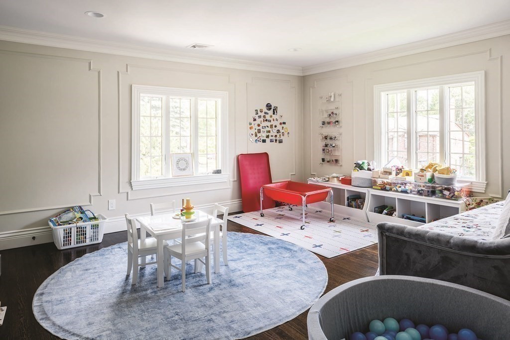 111 Gordon Road Newton, MA 02468 - Photo 15 of 19 a living room with furniture two window and a dining table