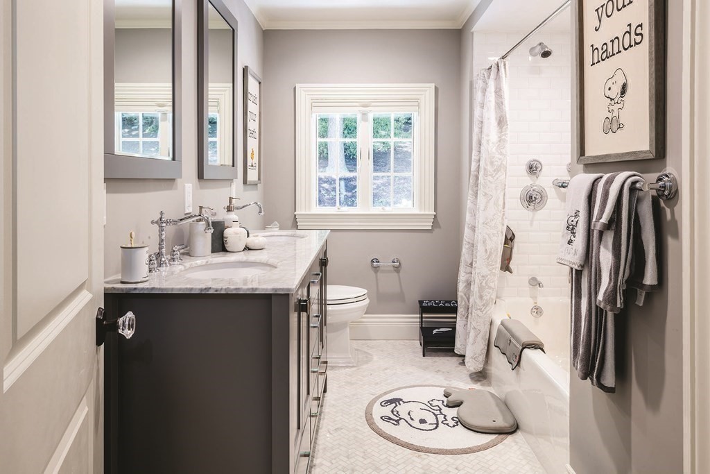 111 Gordon Road Newton, MA 02468 - Photo 16 of 19 a bathroom with a sink and a mirror