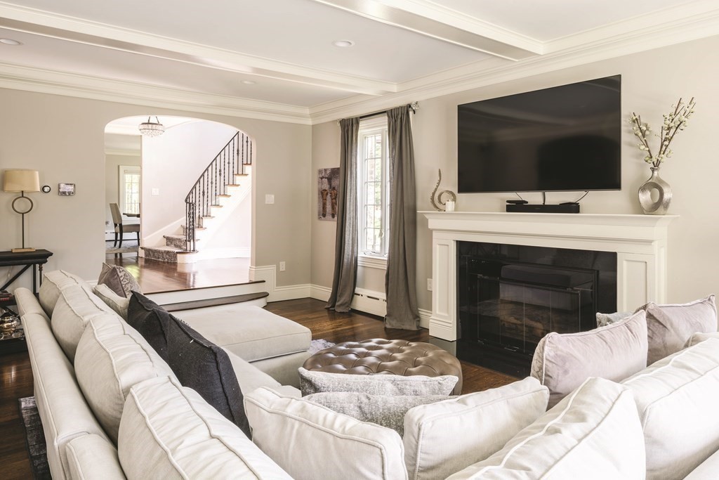 111 Gordon Road Newton, MA 02468 - Photo 4 of 19 a living room with a flat screen tv and a fireplace