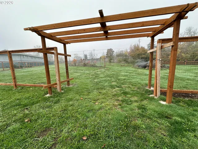 a view of backyard with green space