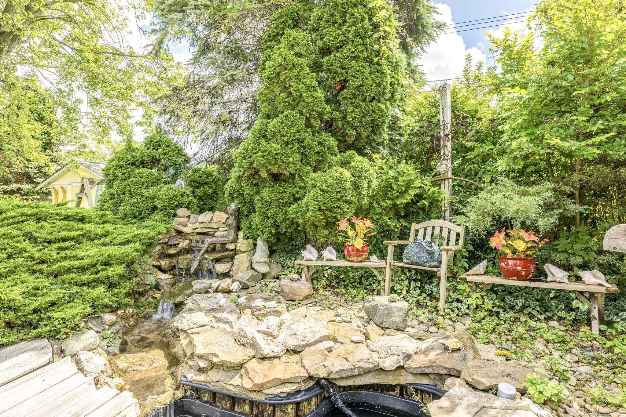 7474 Cardinal Road Lexington, MI 48450 - Photo 44 of 56 Waterfall & Koi Pond