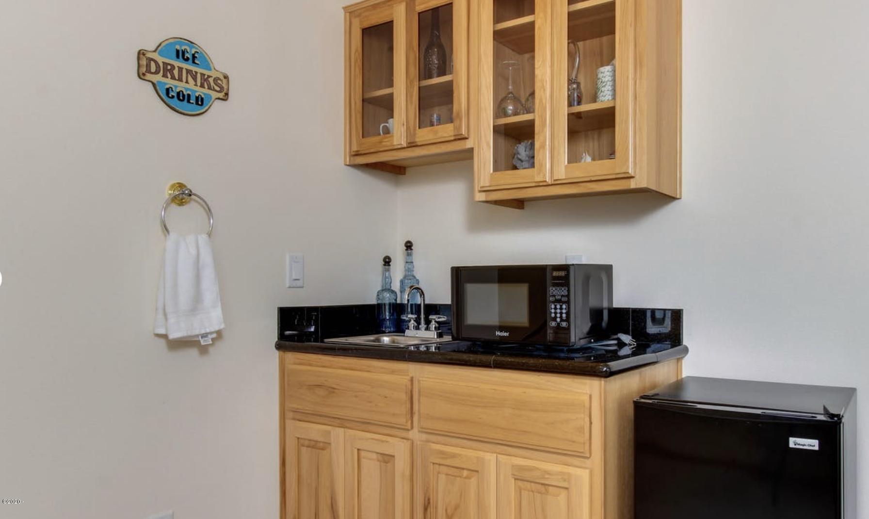 5777 Logan Road Lincoln City, OR 97367 - Photo 19 of 30 Wet Bar in Family Room/Media Room