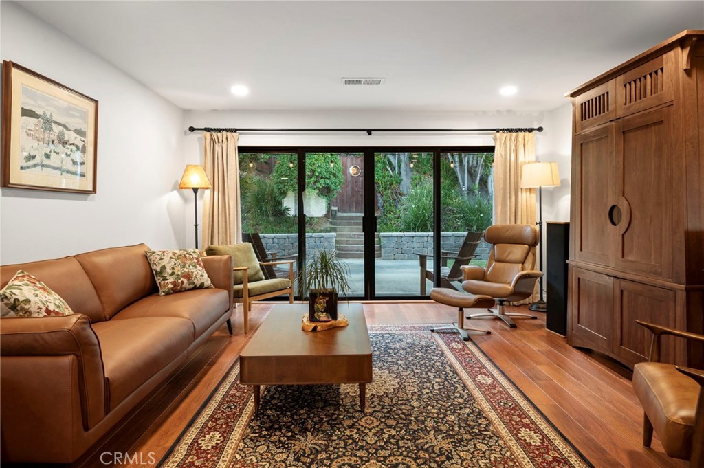 3495 Ridgecrest Drive Carlsbad, CA 92008 - Photo 14 of 42 a living room with furniture and a rug