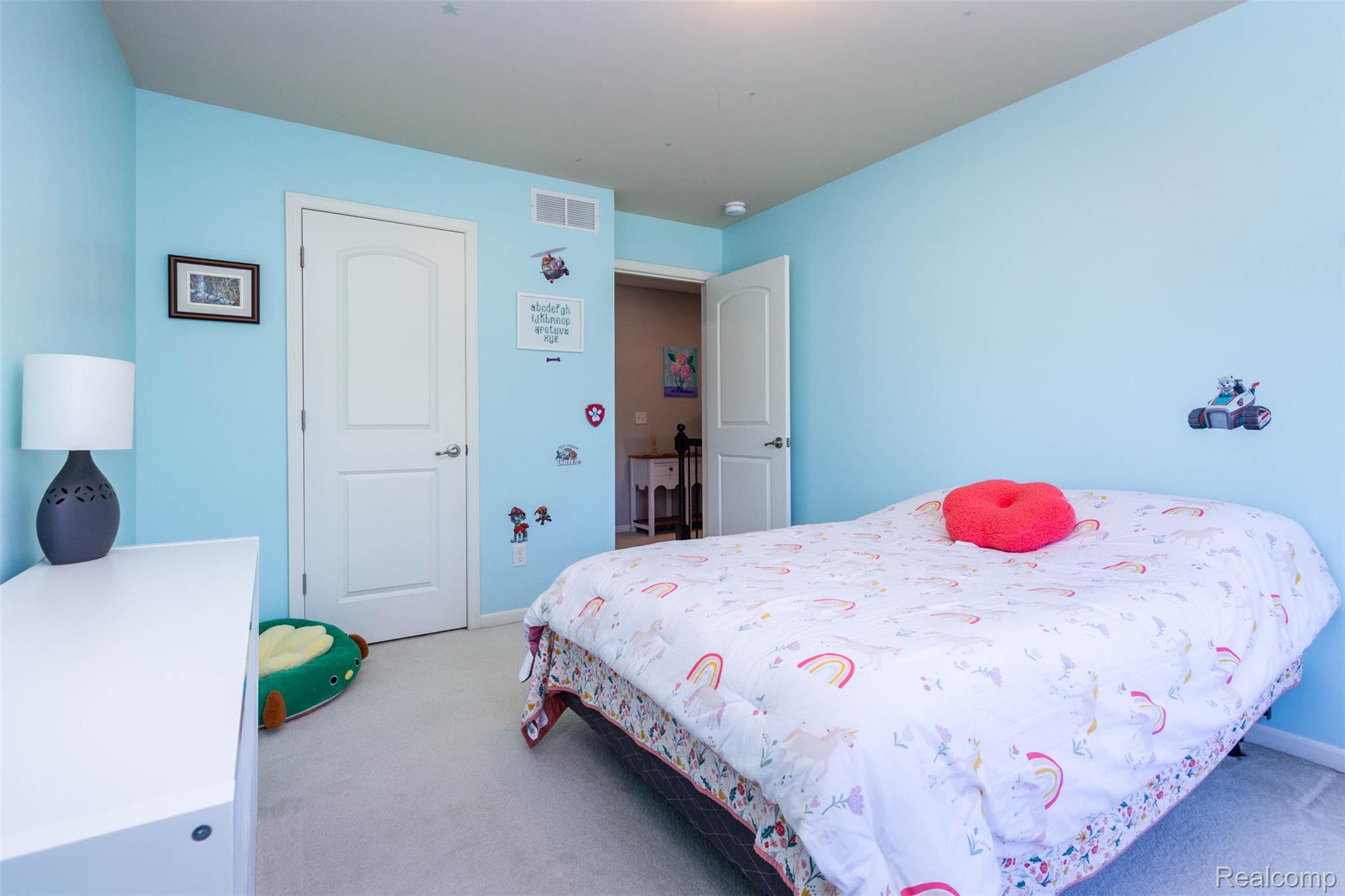 36039 Curtis Road Livonia, MI 48152 - Photo 37 of 61 Bright interior room featuring a light-colored carpet, a white solid-core door, and a second white solid-core door leading to an interior space