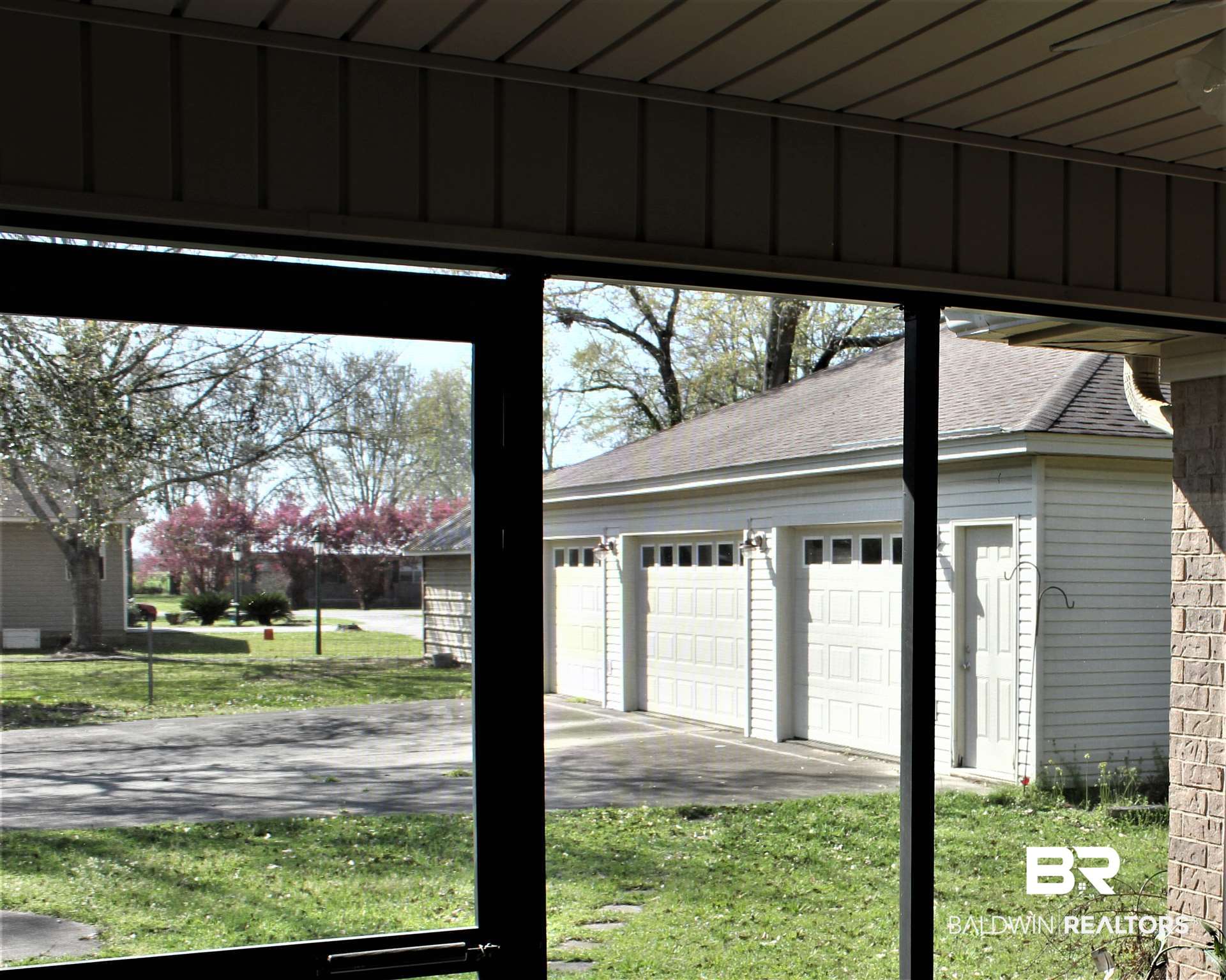 1071 North Oak Street Loxley, AL 36551 - Photo 14 of 25 View from screened porch