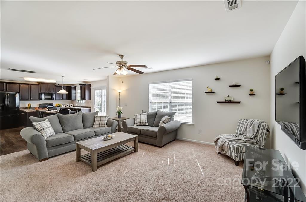 4715 McClure Road Charlotte, NC 28216 - Photo 12 of 36 a living room with furniture and a large window