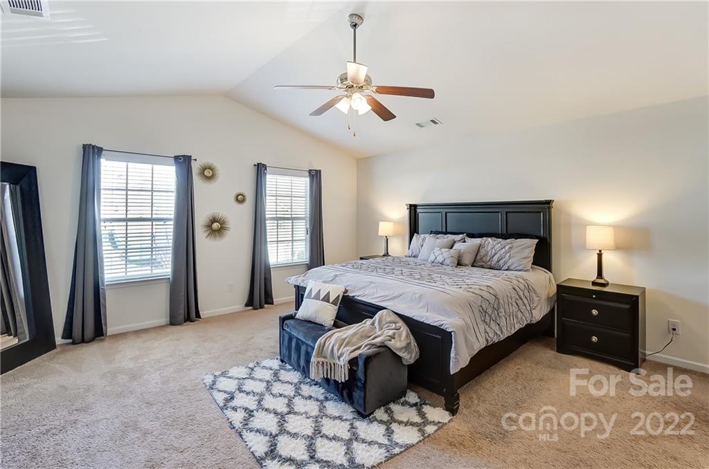 4715 McClure Road Charlotte, NC 28216 - Photo 16 of 36 a bedroom with a bed and window