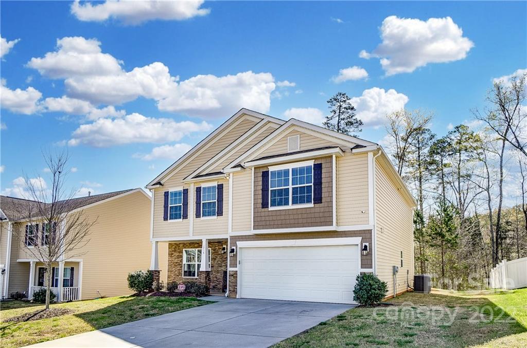 4715 McClure Road Charlotte, NC 28216 - Photo 2 of 36 a front view of a house with garden