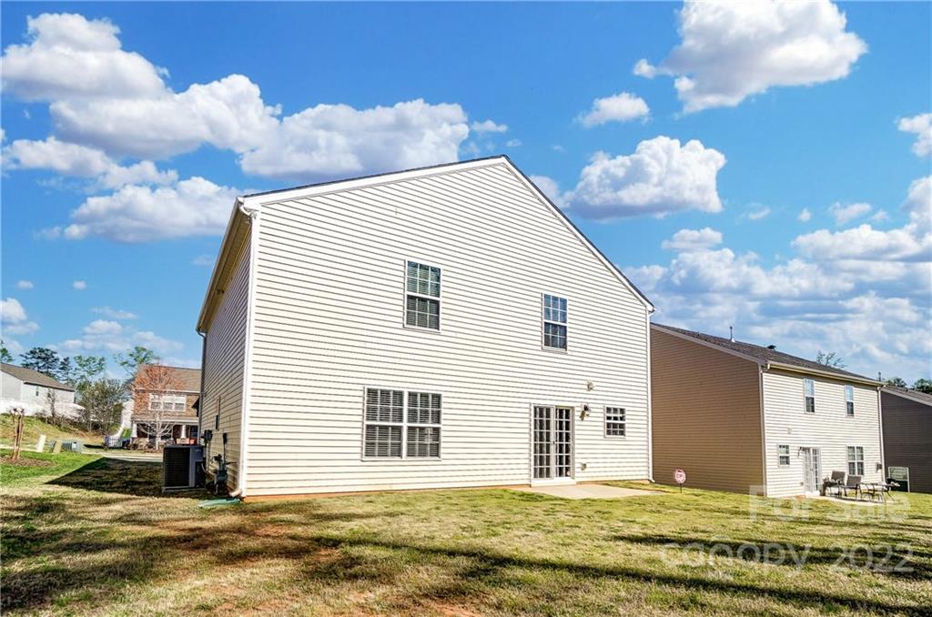 4715 McClure Road Charlotte, NC 28216 - Photo 33 of 36 a view of a house with a yard