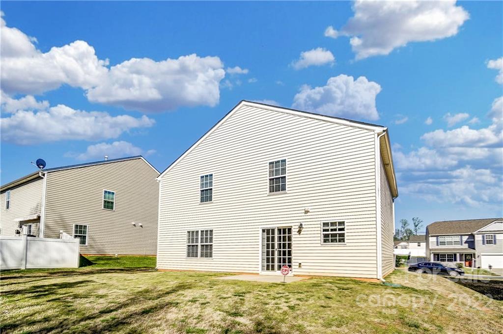 4715 McClure Road Charlotte, NC 28216 - Photo 34 of 36 a view of a house with a barbeque