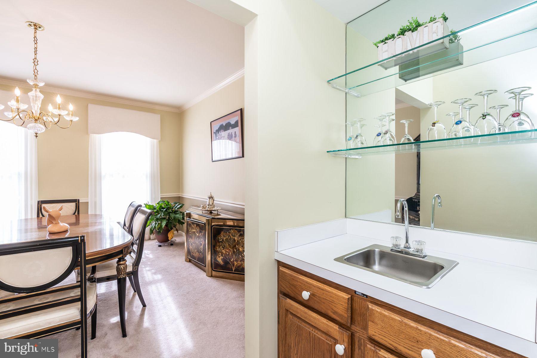 2430 Sunset Farm Road Ellicott City, MD 21042 - Photo 9 of 47 Wet Bar Viewing Dining Room