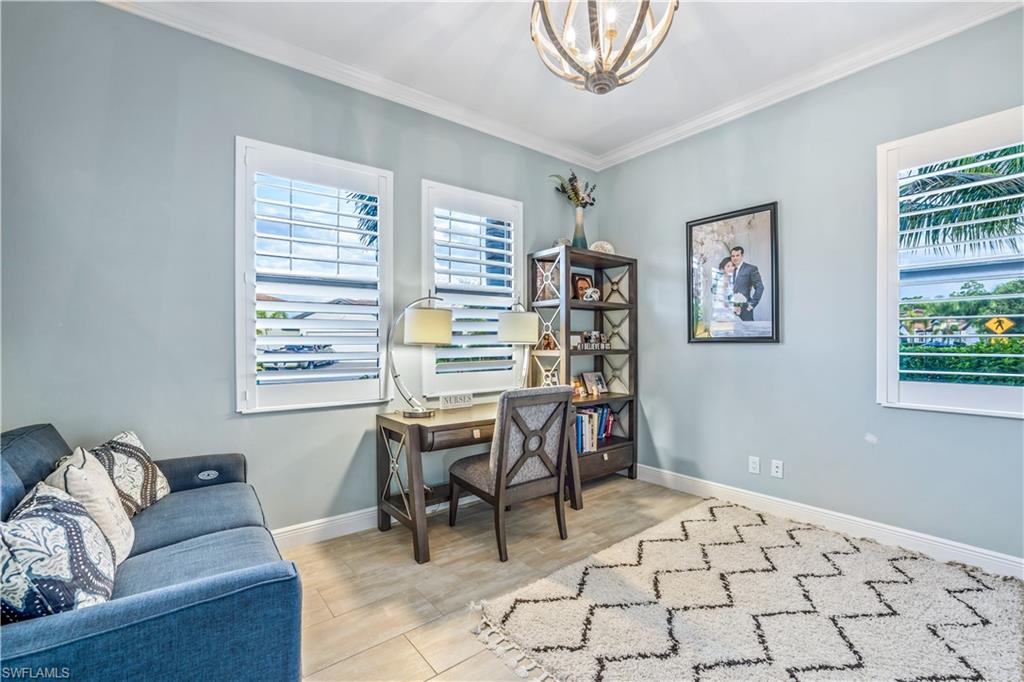 4605 Abaca Circle Naples, FL 34119 - Photo 13 of 35 a view of a livingroom with furniture and window