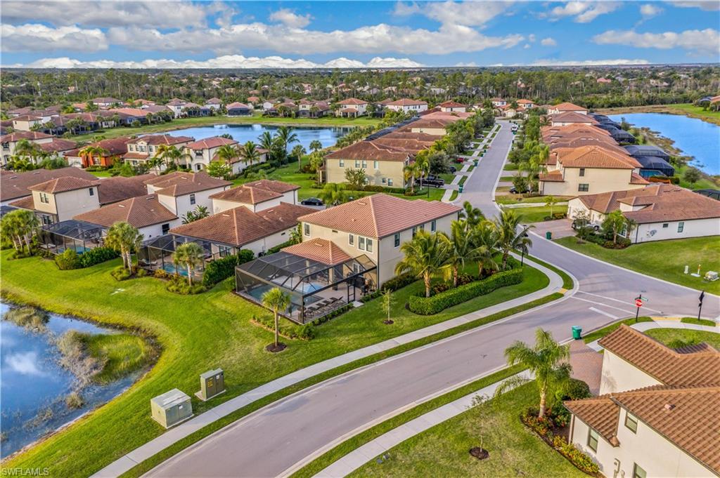 4605 Abaca Circle Naples, FL 34119 - Photo 29 of 35 an aerial view of residential houses with outdoor space