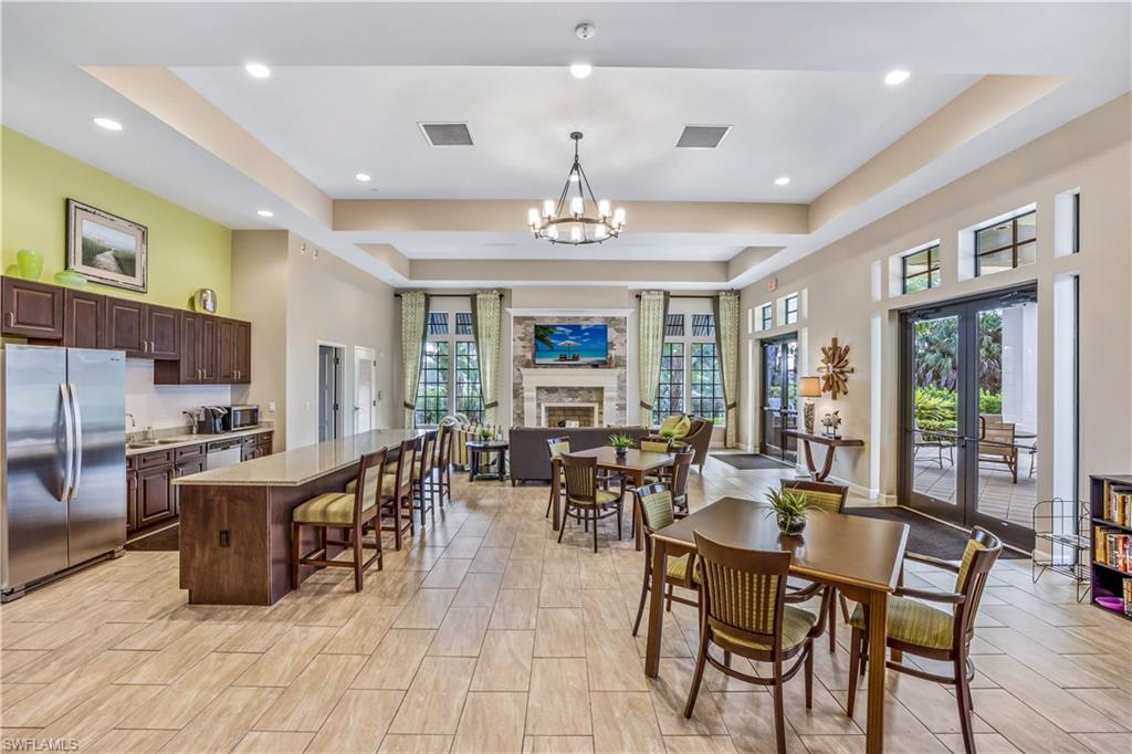 4605 Abaca Circle Naples, FL 34119 - Photo 32 of 35 a view of a dining room with furniture window and outside view