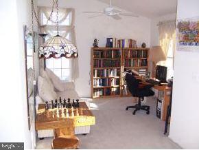 196 Torpedo Road Manahawkin, NJ 08050 - Photo 3 of 6 a view of a workspace with furniture
