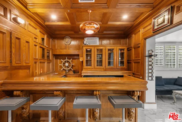 a view of a chairs and a table in a patio