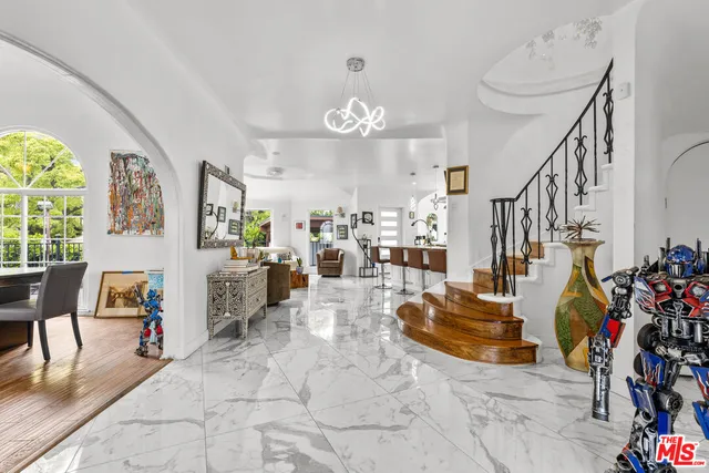 a view of entryway livingroom and hall