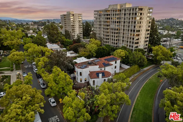 a view of a city with tall buildings
