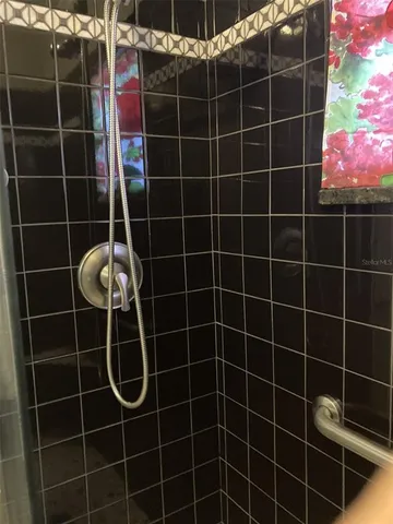 a bathroom with a toilet and a sink