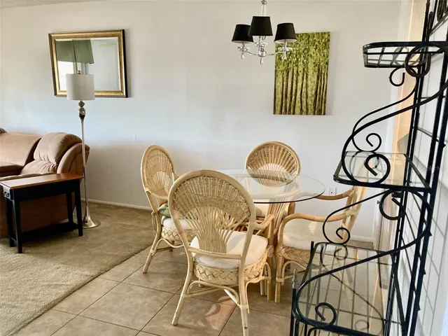 a room with two chairs and a table