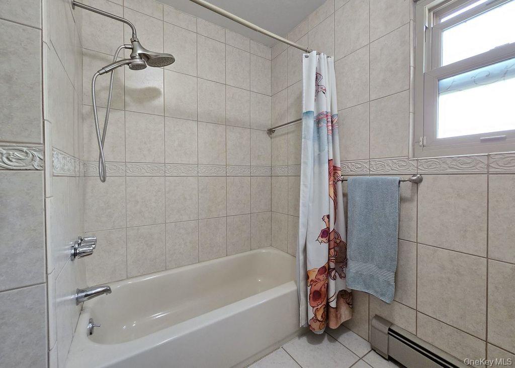 27 Ridgewood Avenue Selden, NY 11784 - Photo 18 of 35 1st floor bathroom