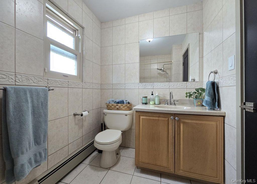 27 Ridgewood Avenue Selden, NY 11784 - Photo 19 of 35 1st floor bathroom
