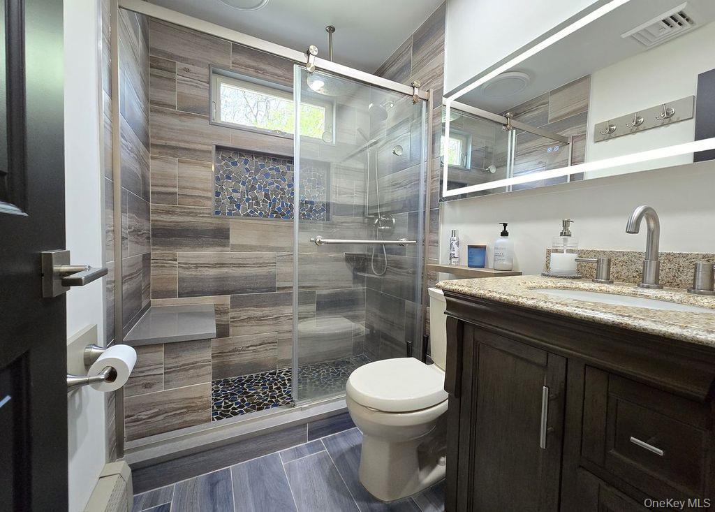 27 Ridgewood Avenue Selden, NY 11784 - Photo 24 of 35 2nd floor bathroom