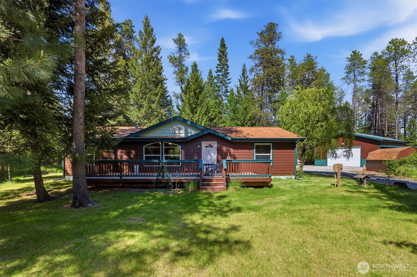 1142 Driskill Road Newport, WA 99156 - Photo 7 of 40 a view of a house with a yard porch and sitting area