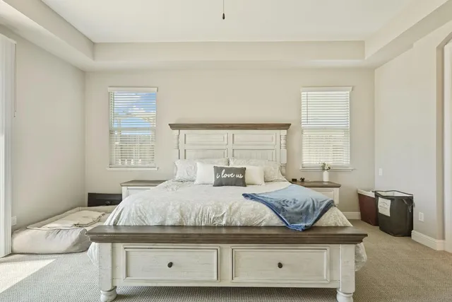 a utility room with sink dryer and washer