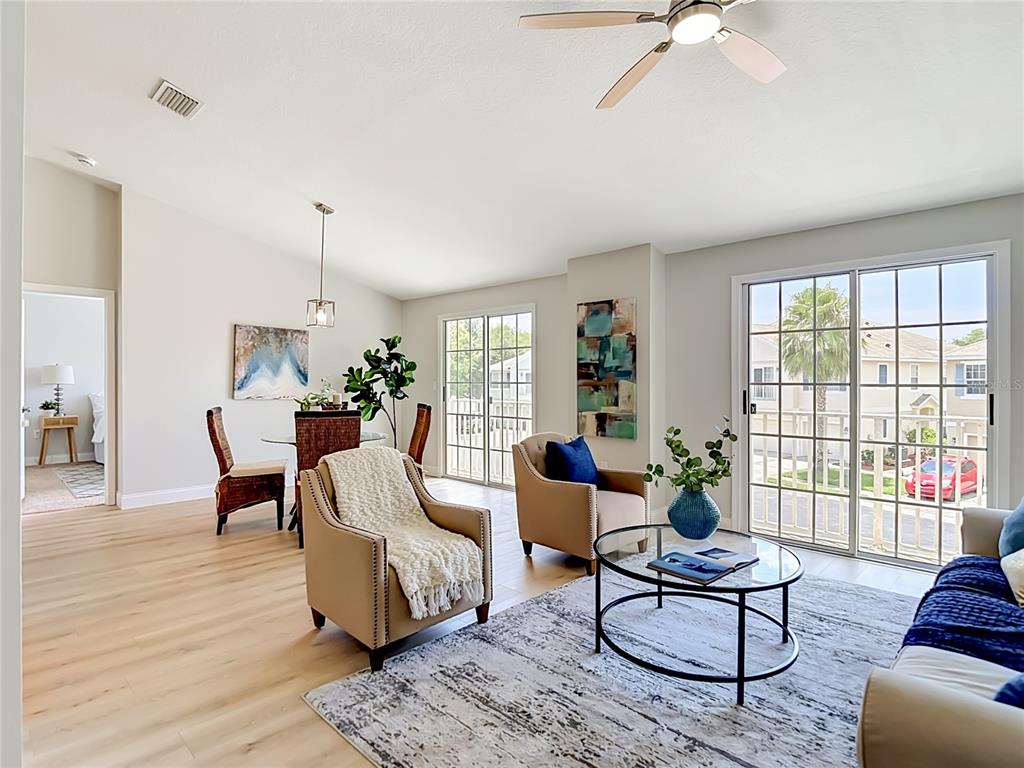 5310 Anhinga Trail New Port Richey, FL 34653 - Photo 5 of 27 a living room with furniture and a large window