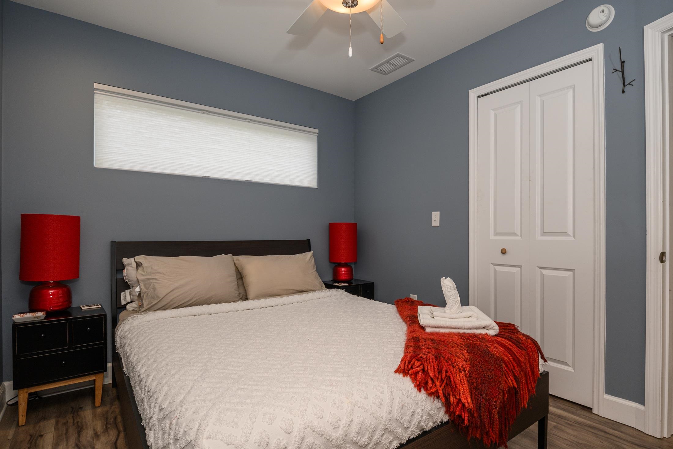 24 Saragossa Street St. Augustine, FL 32084 - Photo 92 of 99 a bedroom with a bed and a window