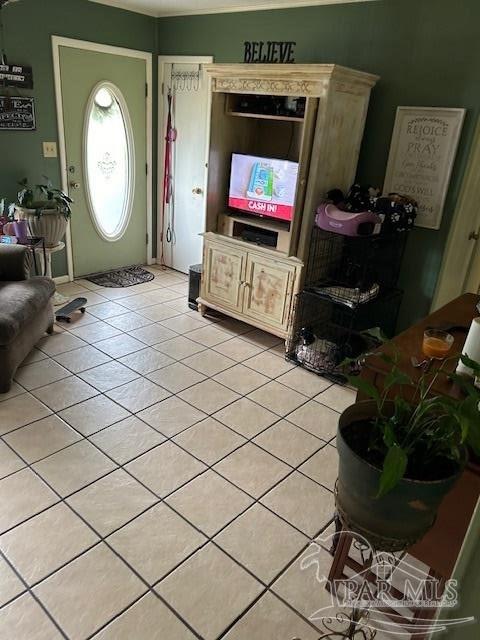 4737 Dean Drive Pace, FL 32571 - Photo 9 of 13 a living room with furniture a flat screen tv and a fireplace