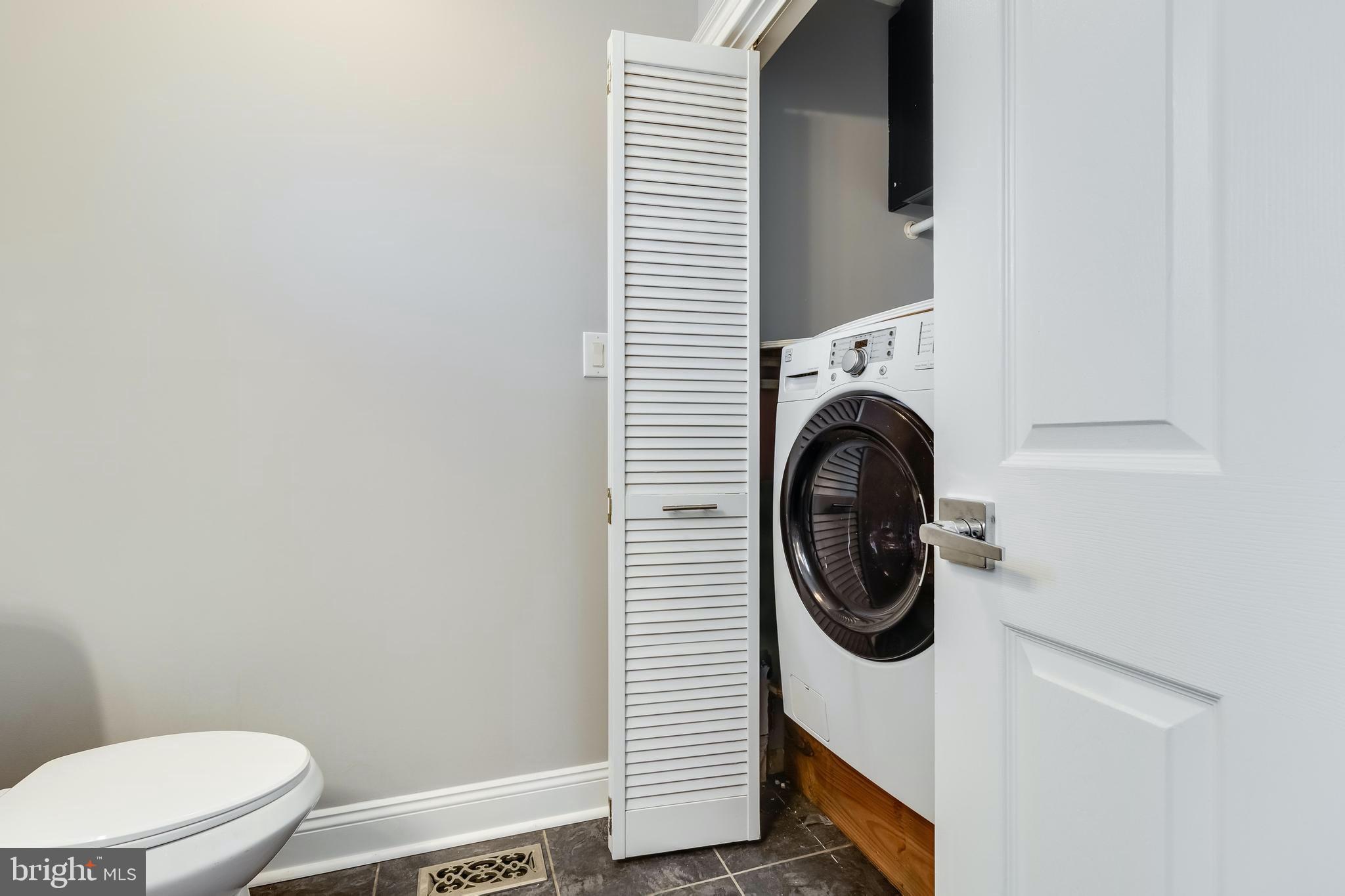 648 Santa Fe Trail Lusby, MD 20657 - Photo 22 of 58 Main level powder room & laundry access