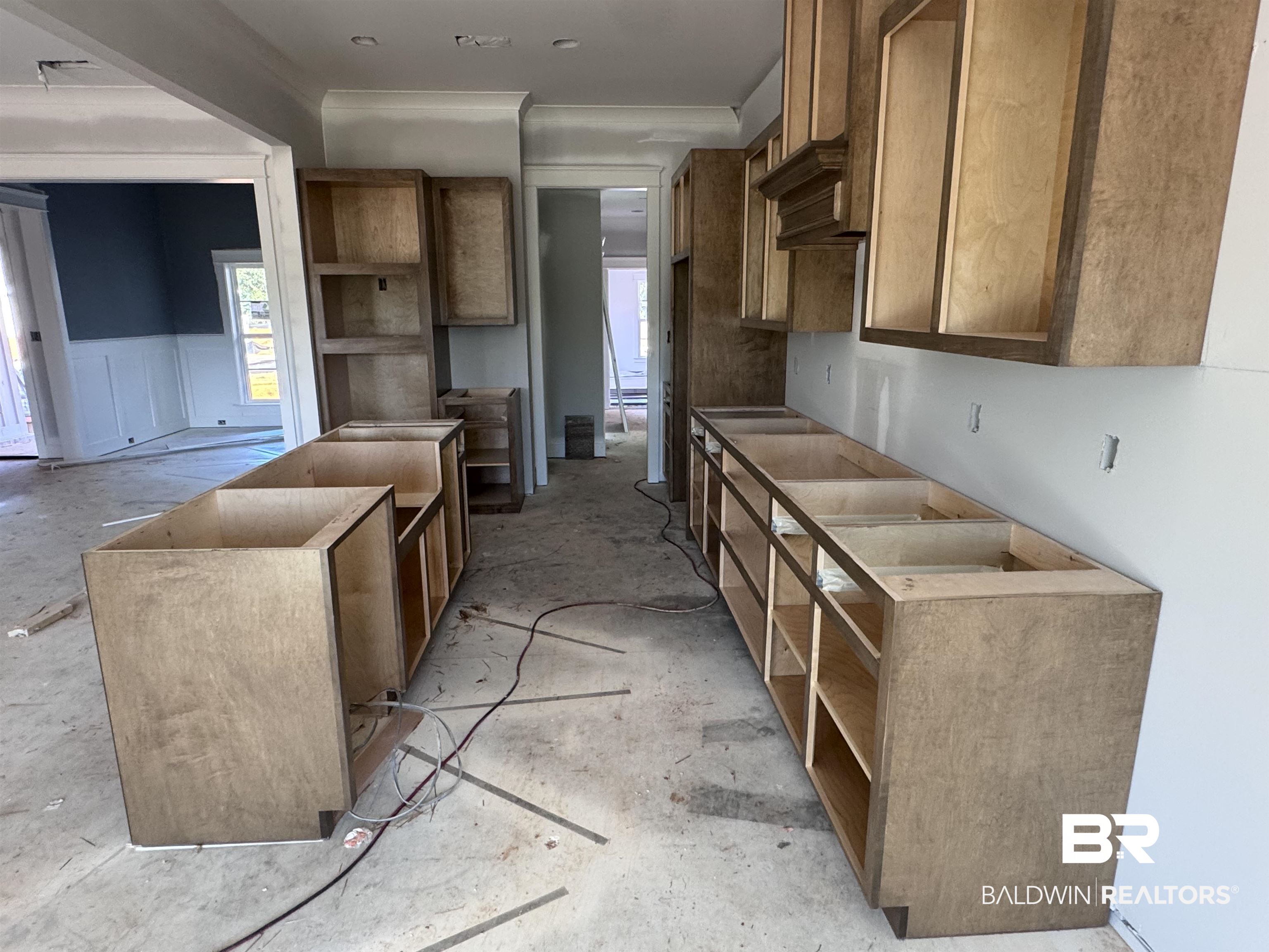 27371 Patch Pl Loop Daphne, AL 36526 - Photo 13 of 63 Kitchen with wood finish cabinets and a kitchen island