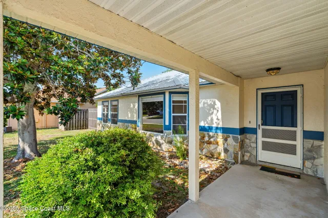 a view of house with outdoor space