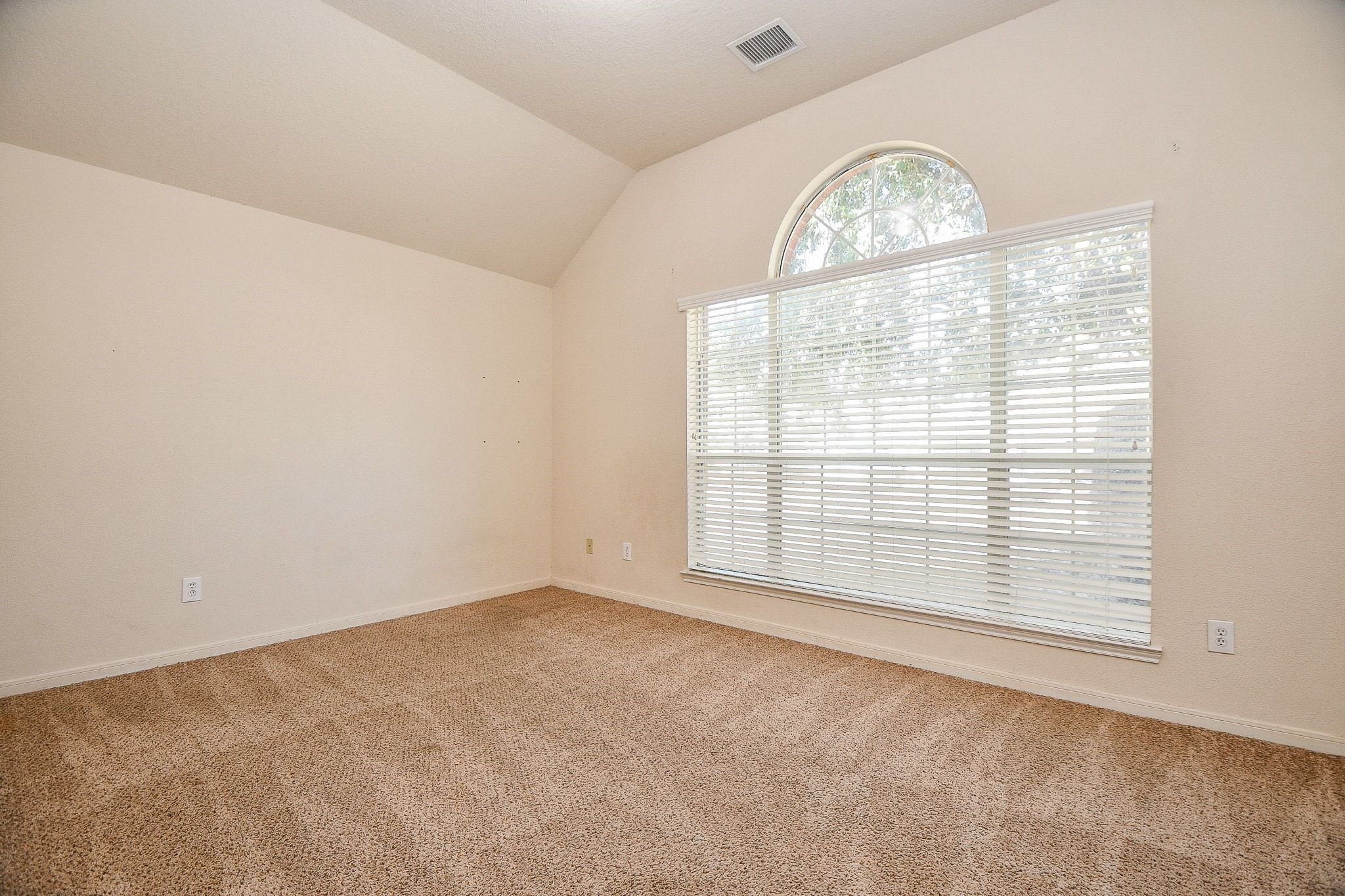 23831 Shaw Perry Lane Katy, TX 77493 - Photo 15 of 20 an empty room with a empty space and windows