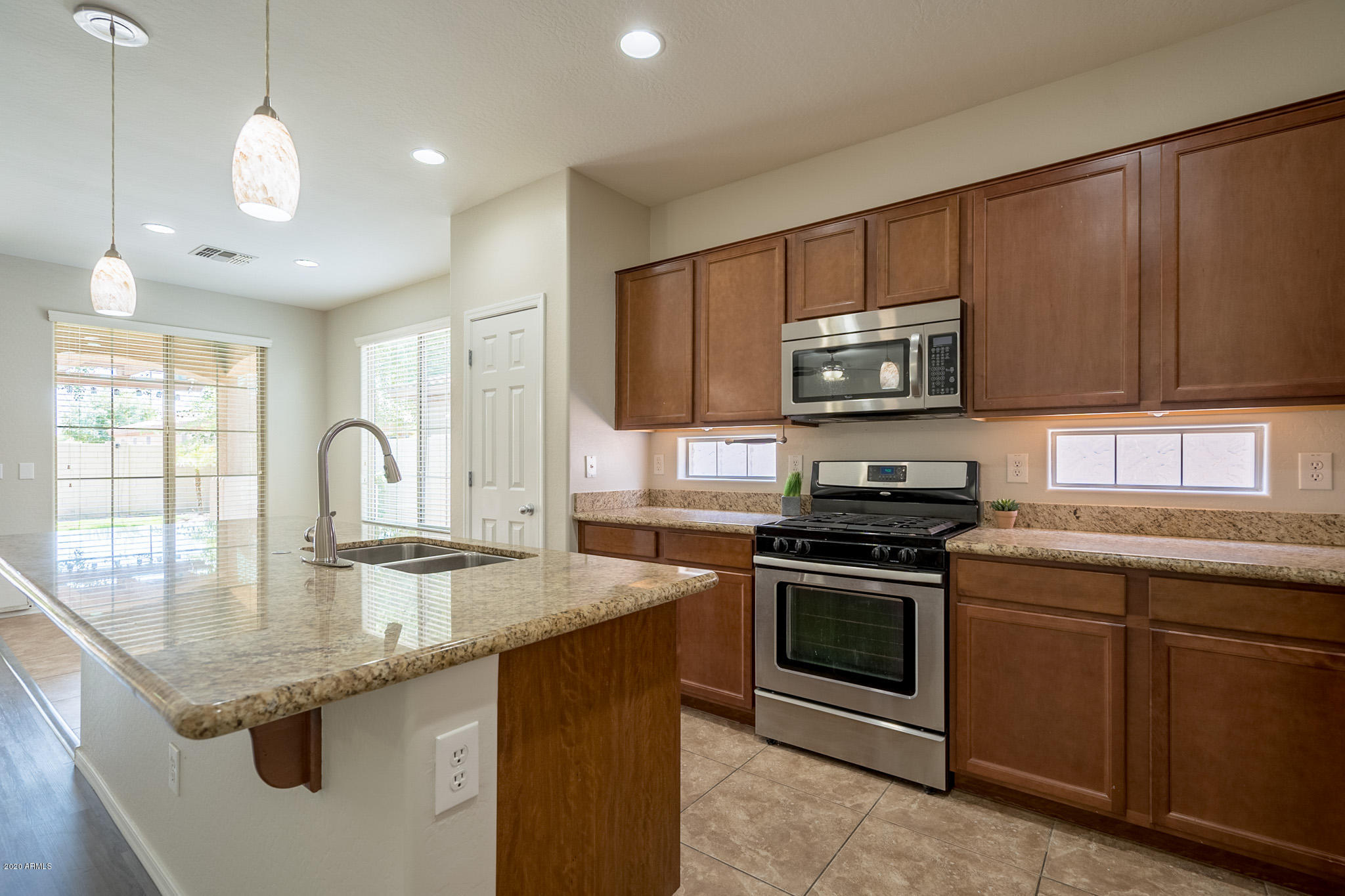 2997 East Ridgewood Lane Gilbert, AZ 85298 - Photo 10 of 52 Granite Kitchen Island