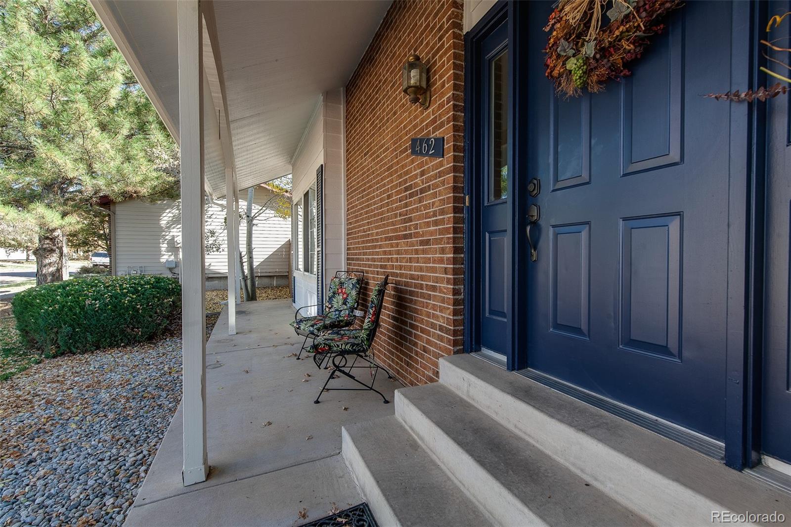 462 Mountain Chickadee Road Highlands Ranch, CO 80126 - Photo 2 of 37 a house view with a backyard space